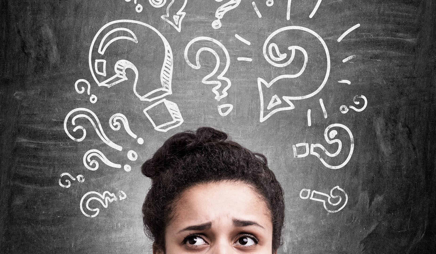 Womans head from eyes up with white question mnarks overhead on a gray background-feeling overwhelmed and confused