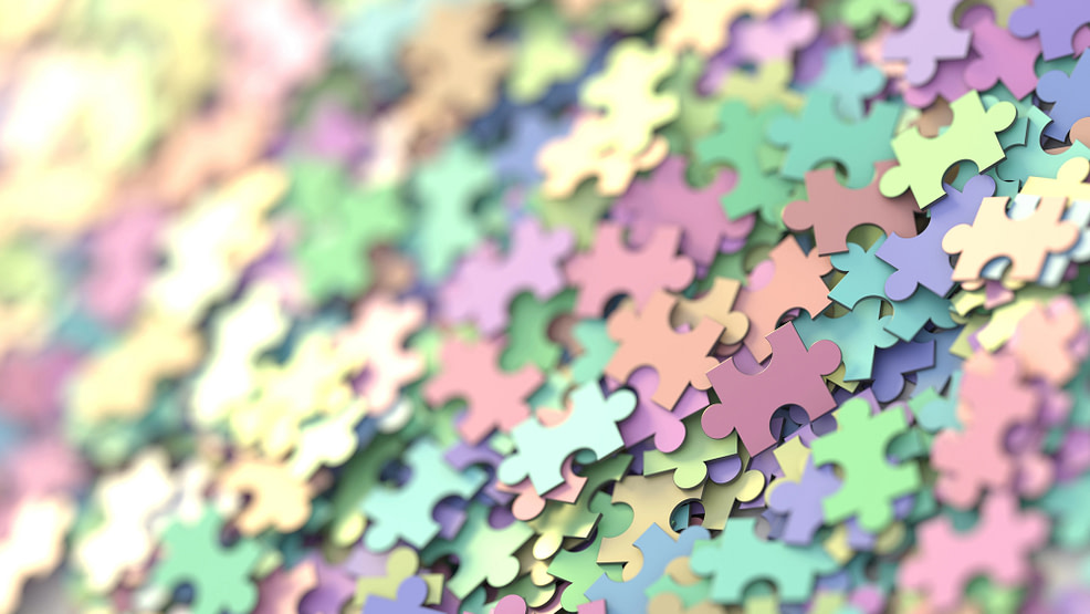 Impossible Puzzle colored puzzle pieces to an endless puzzle