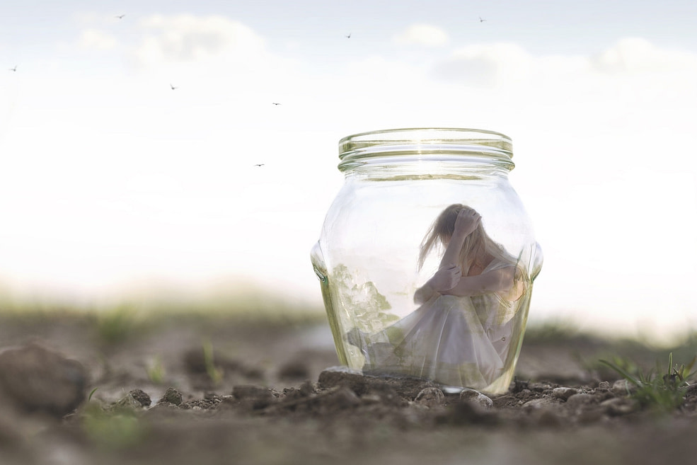 Woman closed in a glass jar Woman closed in a glass jar