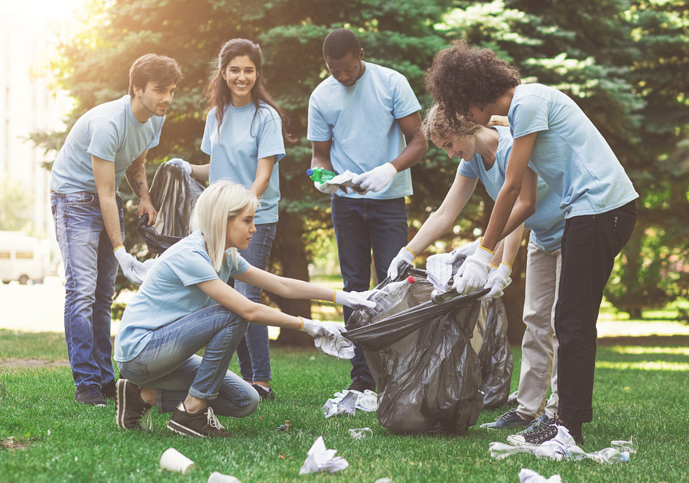 How to be kind-Volunteers picking up garbage in park How to be kind-Volunteers picking up garbage in park