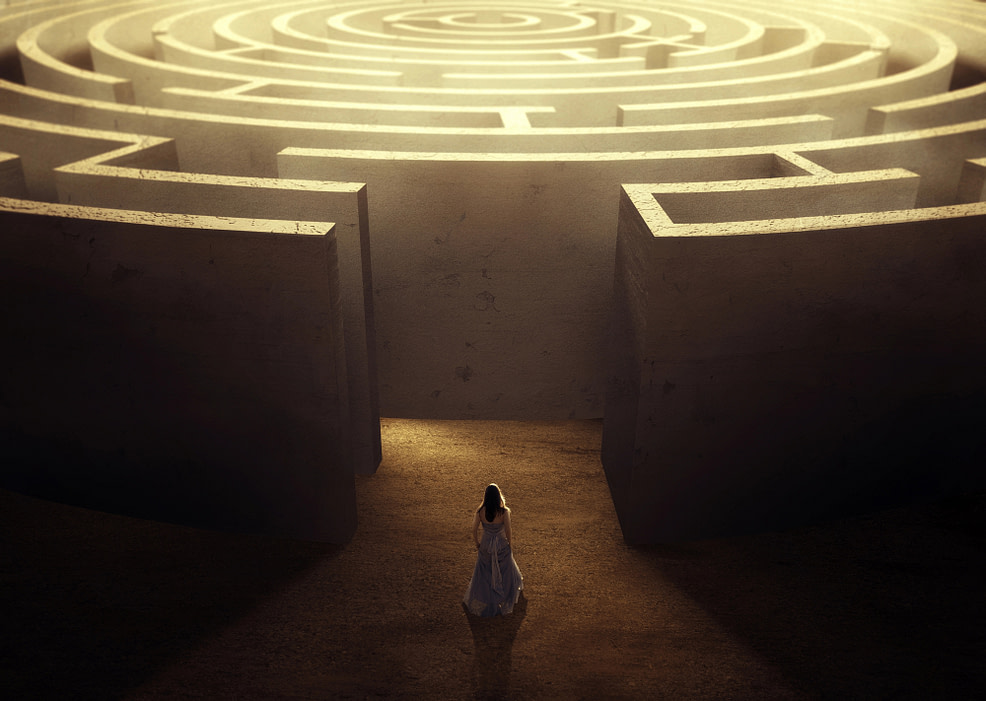 woman lost in maze woman about the enter a maze-getting lost in the maze of life
