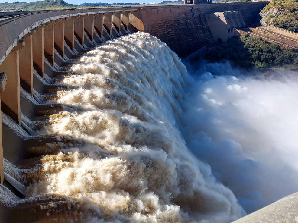 Open the Floodgates The Gariep Dam to represent how compassion breaks open positive change