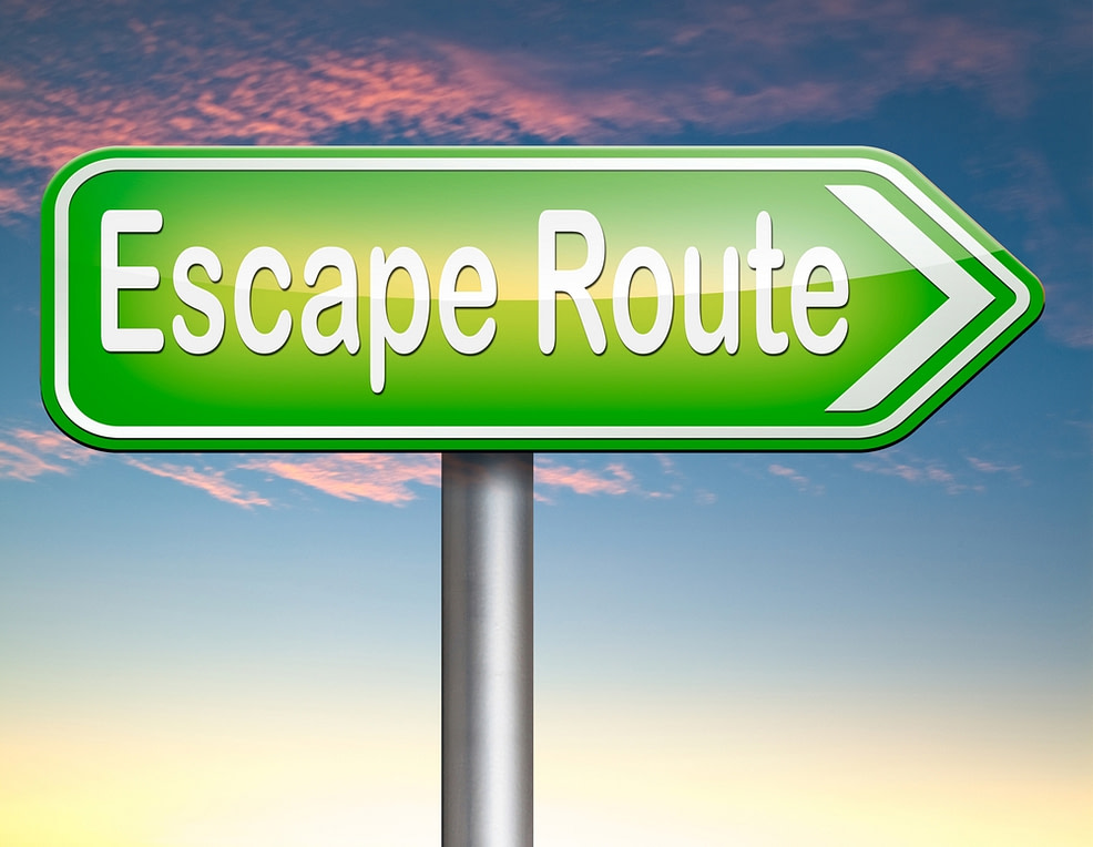 escape route to no longer feeling stuck Street sign reading ‘escape route’ to no longer asking “is there more to life”