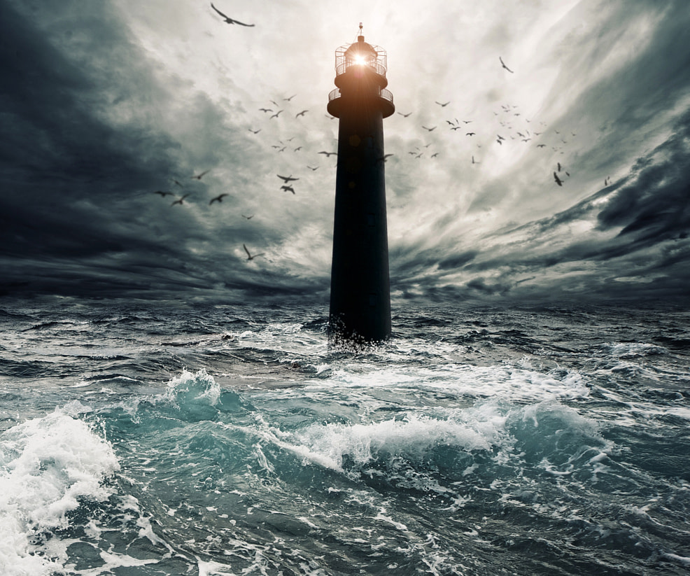 Stormy sky over flooded lighthouse Stormy sky over flooded lighthouse-staying in self in the midst of chaos